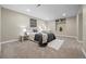 Cozy bedroom with plush carpeting, a serene color palette, and a decorative recessed shelf feature at 19061 Eagle Ridge Dr, Golden, CO 80401