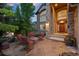 Inviting stone front patio with cozy seating area, perfect for relaxing and enjoying the outdoors at 19061 Eagle Ridge Dr, Golden, CO 80401