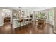 Well-equipped kitchen featuring a large island with bar seating and a dining area nearby at 19061 Eagle Ridge Dr, Golden, CO 80401