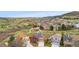 Panoramic aerial shot showcasing the home's location near community trails and open spaces at 7507 Halleys Dr, Littleton, CO 80125