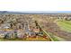 Neighborhood aerial view showcasing nearby walking trails, mature trees, and community charm at 7507 Halleys Dr, Littleton, CO 80125