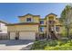 Charming home with a lush lawn, beautiful landscaping, and a cozy second story porch at 10703 Flagler Dr, Parker, CO 80134