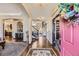 Inviting foyer showcasing beautiful hardwood floors and an elegant, open design at 10703 Flagler Dr, Parker, CO 80134