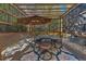 Outdoor dining area featuring shaded seating, elegant decor, and a cozy ambiance at 10703 Flagler Dr, Parker, CO 80134