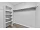 A functional closet featuring custom built-in shelving for clothes and storage to maximize space at 2835 S Monaco Pkwy # 4-103, Denver, CO 80222