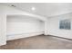 Finished basement with built-in shelving at 9167 E 35Th Ave, Denver, CO 80238