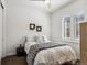 Bedroom with window shutters and bedside table at 9167 E 35Th Ave, Denver, CO 80238