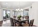 Spacious dining area with sliding glass doors to backyard at 9167 E 35Th Ave, Denver, CO 80238