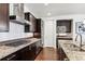 Kitchen features stainless steel appliances and granite counters at 9167 E 35Th Ave, Denver, CO 80238