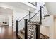 Modern staircase with dark wood and metal railings at 9167 E 35Th Ave, Denver, CO 80238