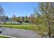 Residential street view showcasing tree-lined sidewalks and homes at 9167 E 35Th Ave, Denver, CO 80238