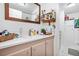 Bathroom with single sink vanity, and mirrored medicine cabinet at 6440 - 6450 W 35Th Ave, Wheat Ridge, CO 80033