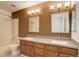 Bathroom featuring a double sink vanity, shower/tub, and neutral colored walls at 10971 Bryant St, Westminster, CO 80234
