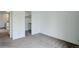 Bright bedroom with neutral carpet and a walk-in closet offers a clean, adaptable space at 10971 Bryant St, Westminster, CO 80234