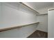 Walk-in closet with shelving and bar for hanging clothing at 10971 Bryant St, Westminster, CO 80234