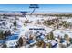Aerial view showcasing home's proximity to The Pinery Country Club and Bingham Lake at 6017 Thunder Hill Rd, Parker, CO 80134