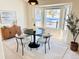 Charming dining room with a bay window and seating for four at 6017 Thunder Hill Rd, Parker, CO 80134