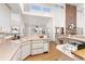 Kitchen with pink countertops and ample cabinetry at 6017 Thunder Hill Rd, Parker, CO 80134