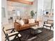 Living room with comfortable seating and a view into the kitchen at 6017 Thunder Hill Rd, Parker, CO 80134