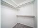 Walk-in closet with carpet and organized storage shelves and rods, ideal for optimized wardrobe management at 13585 E 103Rd Pl, Commerce City, CO 80022