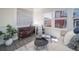 Modern living space with a stylish buffet and decorative artwork at 13585 E 103Rd Pl, Commerce City, CO 80022