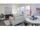 Comfortable living space with stylish furniture and neighborhood view at 13585 E 103Rd Pl, Commerce City, CO 80022