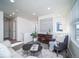 Cozy living room area with stylish decor and natural light at 13585 E 103Rd Pl, Commerce City, CO 80022