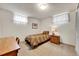Small bedroom with a bed and desk at 7861 Osceola St, Westminster, CO 80030