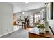 Inviting dining area with a breakfast bar and access to an enclosed patio space at 7861 Osceola St, Westminster, CO 80030