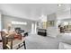 Cozy living room featuring neutral tones, comfortable seating, and ample lighting at 7861 Osceola St, Westminster, CO 80030
