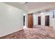 Finished basement with carpet, storage, and walk in closet at 10731 Rosalie Dr, Northglenn, CO 80233