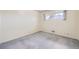 Bedroom with a window, neutral walls, and carpeting at 10731 Rosalie Dr, Northglenn, CO 80233