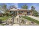 Charming brick home with landscaped front yard and inviting entrance at 10731 Rosalie Dr, Northglenn, CO 80233