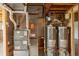 Mechanical equipment and water heaters in the unfinished basement at 116 Willowleaf Dr, Littleton, CO 80127