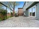 This backyard features a concrete patio with outdoor seating and a grill at 1474 E Weldona Way, Superior, CO 80027