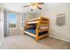 bedroom with natural light, a bunk bed and neutral walls at 1474 E Weldona Way, Superior, CO 80027