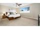 This main bedroom features a large window with natural light and a neutral color scheme at 1474 E Weldona Way, Superior, CO 80027