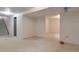 Partially finished basement with neutral carpet and a staircase leading to the upper level at 5138 S Sedalia Ct, Centennial, CO 80015