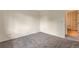 Neutral bedroom with carpet and a view into an en-suite bathroom at 5138 S Sedalia Ct, Centennial, CO 80015