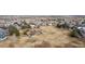 Aerial shot of a neighborhood playground surrounded by homes and green spaces, great for and outdoor activities at 11594 Yellow Daisy Dr, Parker, CO 80134