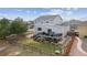 Spacious backyard with a large deck, perfect for entertaining, plus a partially fenced yard at 11594 Yellow Daisy Dr, Parker, CO 80134