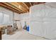 Unfinished basement space with exposed ductwork and a window at 11594 Yellow Daisy Dr, Parker, CO 80134