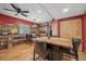 Dining area with bar seating and butcher block dining table with four chairs at 11594 Yellow Daisy Dr, Parker, CO 80134