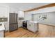 Bright and spacious kitchen featuring modern appliances, sleek countertops, and an open layout at 7801 Pontiac St, Commerce City, CO 80022