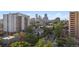 Picturesque views of the Denver skyline surrounded by lush greenery at 740 N Pearl St # 606, Denver, CO 80203