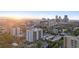 Aerial view of the city skyline with a golden sunset, capturing surrounding buildings at 740 N Pearl St # 606, Denver, CO 80203