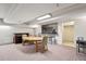 Open dining room area featuring a table and chairs, with an adjoined bar area at 740 N Pearl St # 606, Denver, CO 80203