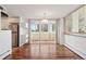 Dining room area with hardwood floors and access to balcony at 740 N Pearl St # 606, Denver, CO 80203