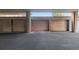 Parking garage space featuring multiple parking spaces with neutral color walls at 740 N Pearl St # 606, Denver, CO 80203