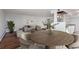 Living room and dining area featuring hardwood floors, neutral tones, and modern decor at 740 N Pearl St # 606, Denver, CO 80203